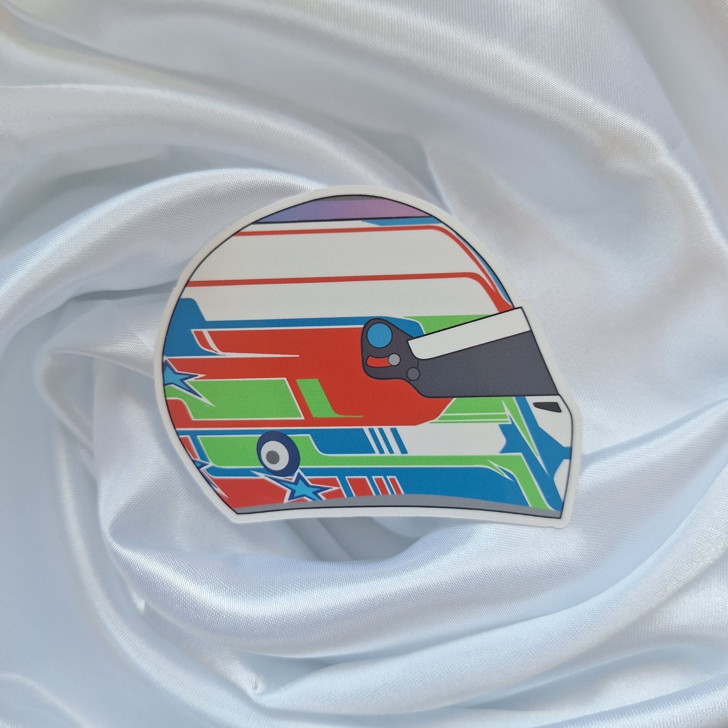 Kimi Antonelli helmet vinyl sticker featuring a colourful racing helmet design inspired by the Formula 1 driver's iconic helmet livery.