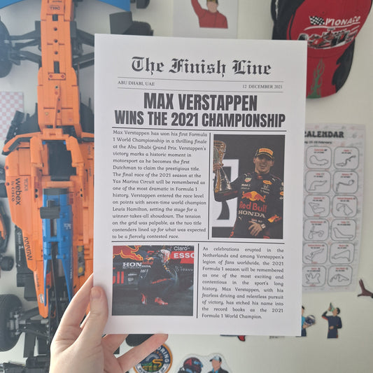 Max Verstappen 2021 World Championship newspaper print featuring Red Bull Racing imagery and celebrations from the Abu Dhabi Grand Prix.