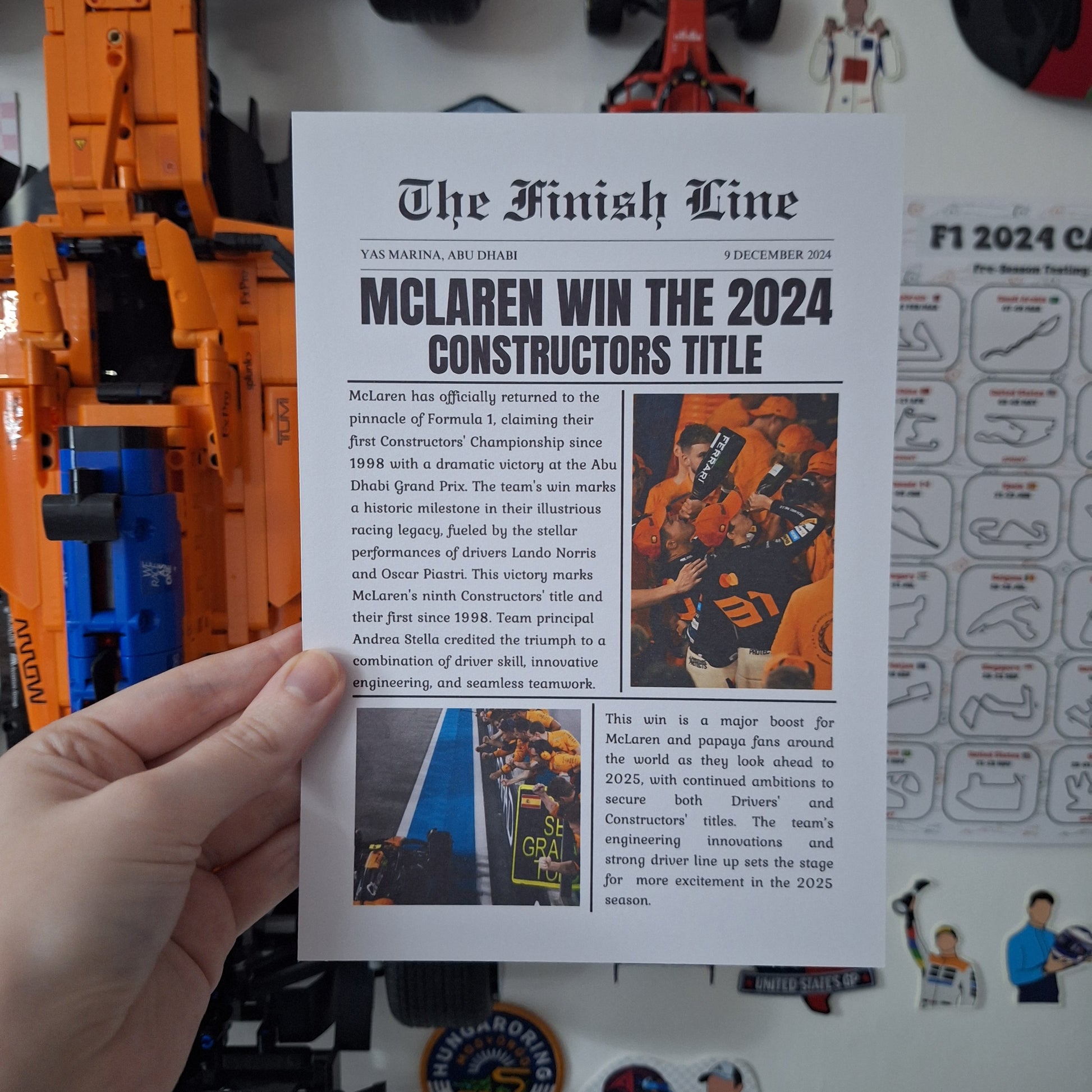 McLaren 2024 Constructors' Championship newspaper print featuring Abu Dhabi Grand Prix celebrations and a vintage newspaper front page design.