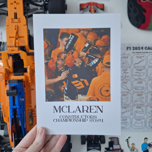 McLaren Constructors' Championship 2024 Formula 1 print featuring championship celebrations in papaya orange, printed on premium cardstock.