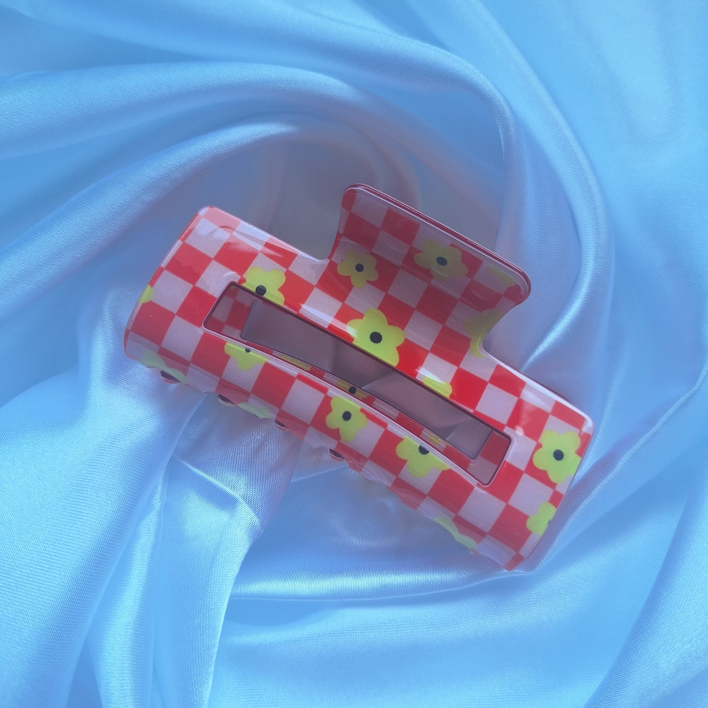 pink gingham F1 inspired racing hair claw clip with floral details and checkered design