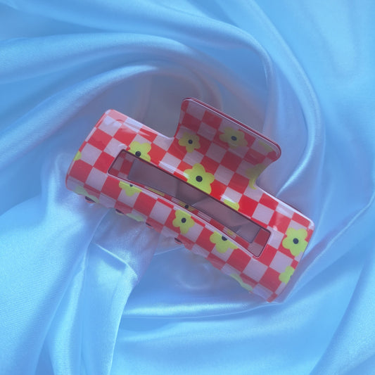 pink gingham F1 inspired racing hair claw clip with floral details and checkered design