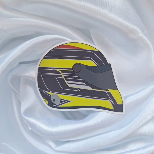 Sergio Pérez 2026 Formula 1 helmet sticker featuring a yellow, black and grey racing helmet design on a white background.